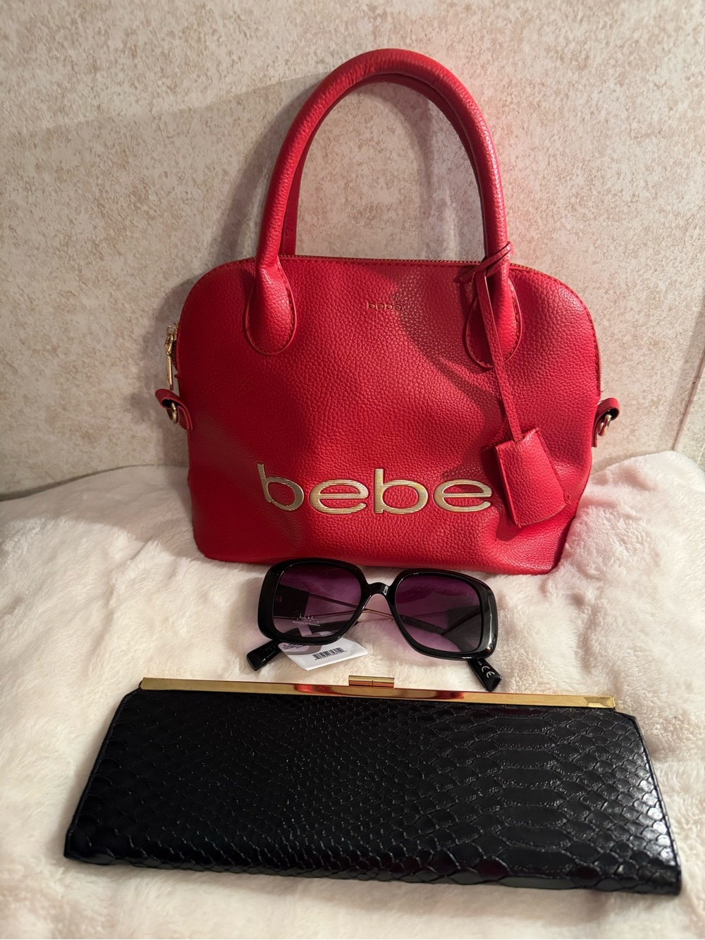 bebe Red Pebbled Leather Satchel, Clutch and Sunglasses.